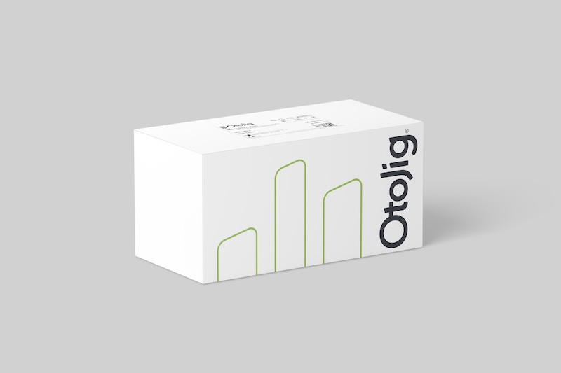 OtoJig package. A white box with parts of the artistic OtoJig logo.